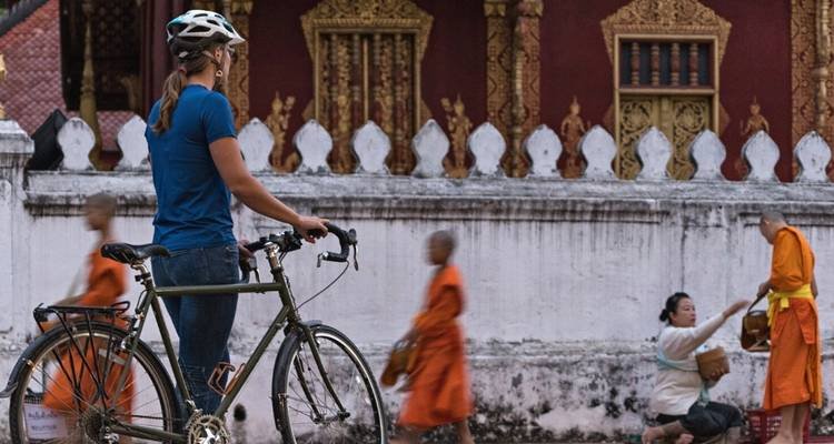 Beyond the Gilded Stupas: The Ultimate Cultural E-Bike Tour in the Laos Capital